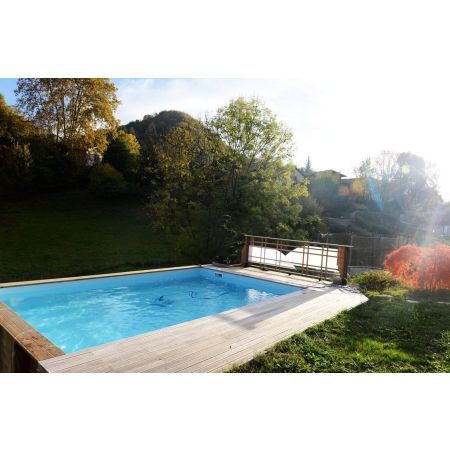 Piscine Bois Luxe Rectangulaire, 520x320x131 cm. Design élégant, structure en bois durable avec garantie de 15 ans, idéale pour détente familiale et relaxation quotidienne dans un cadre luxueux.